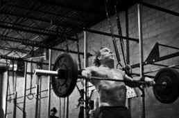 Mike Gagnon lifts a barbell to his chest