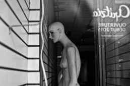 manequin in storefront window